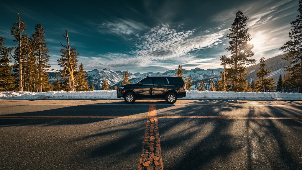 Black Toyota Land Cruiser 70 Series on a scenic mountain road